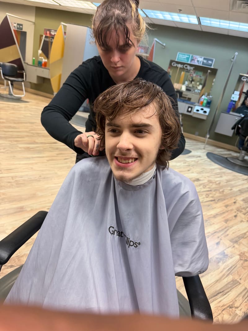 PAAL student getting a haircut at a local salon — practicing real-world independence